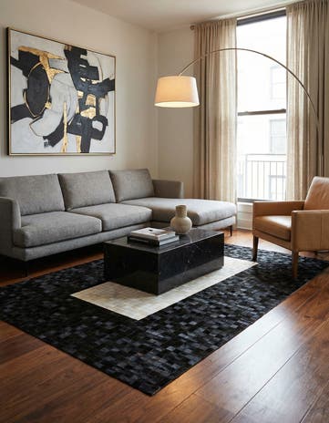 5' 2 x 8' 1 Cowhide Stocks Rug