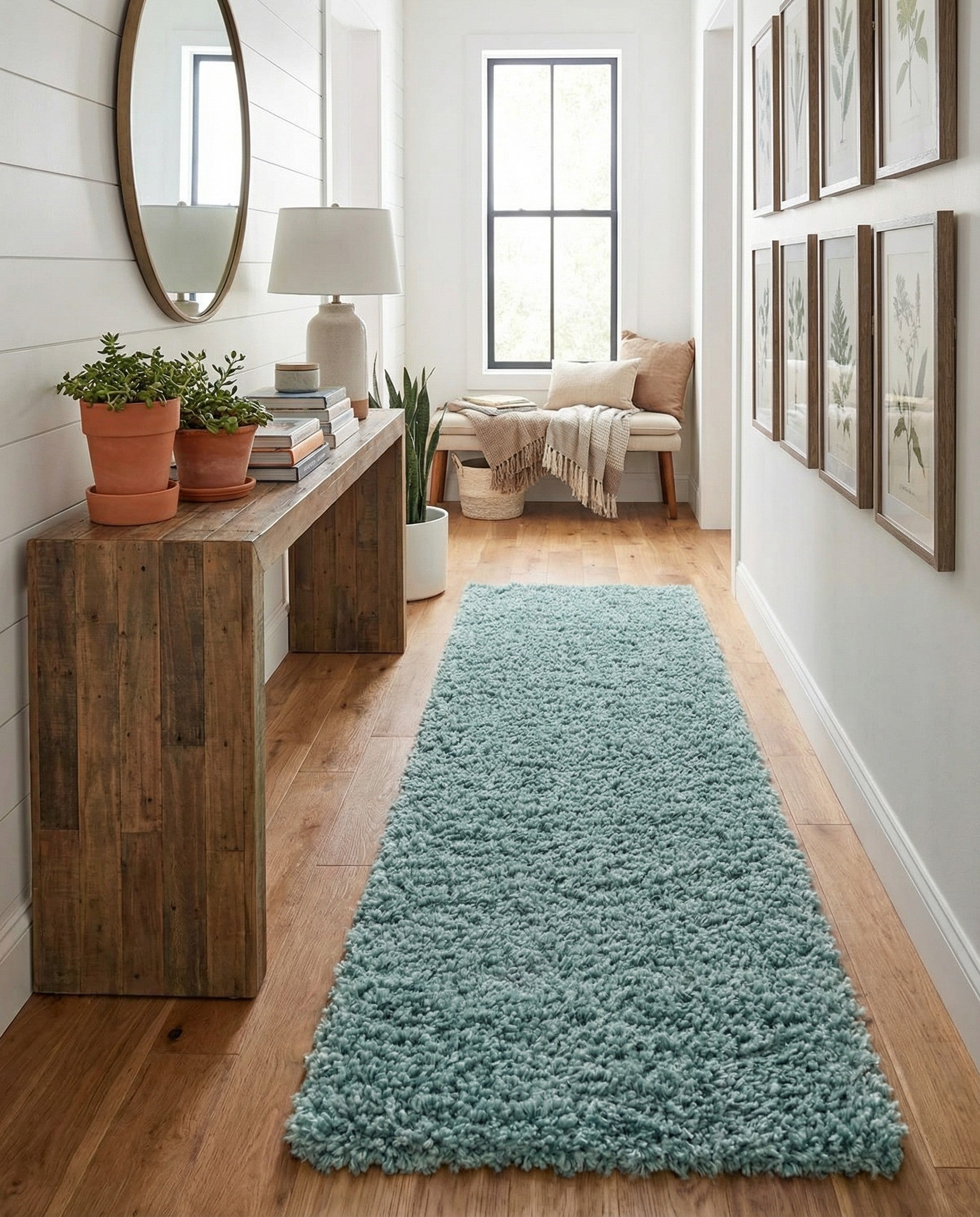 A long, rectangular 16 ft runner rug from the Zermatt Shag collection in a solid, plush blue color, ideal for a hallway.