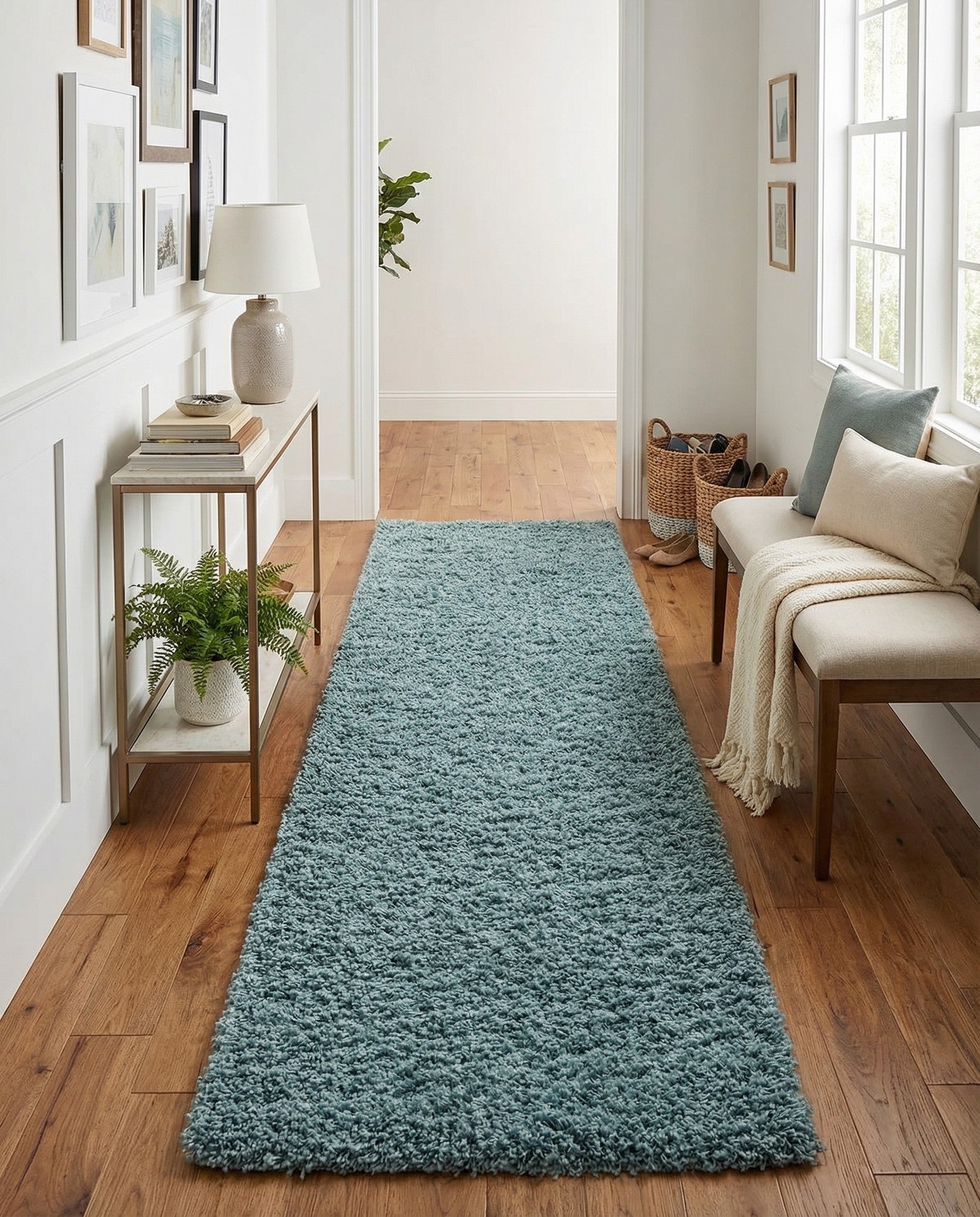 A long, plush 16 ft runner rug in a solid light blue color, featuring a soft shag pile texture.