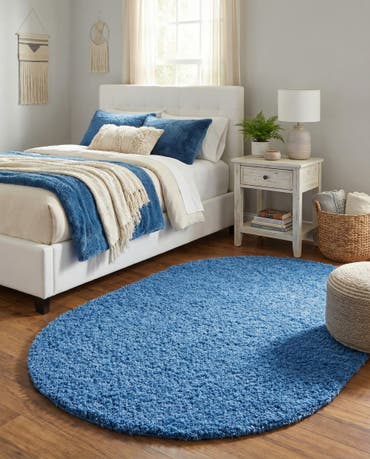  5' 3 x 8' Solid Shag Oval Rug