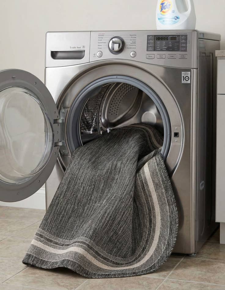 Detail image of 5' 3 x 8'  Washable Border Indoor / Outdoor Oval Rug