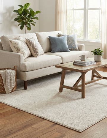 Ivory Solid Frieze Rug
