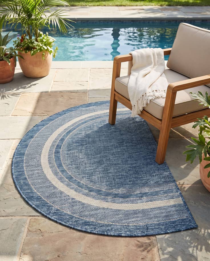 Detail image of 2' 7 x 4' Easy-Clean Border Indoor / Outdoor Hearth Rug