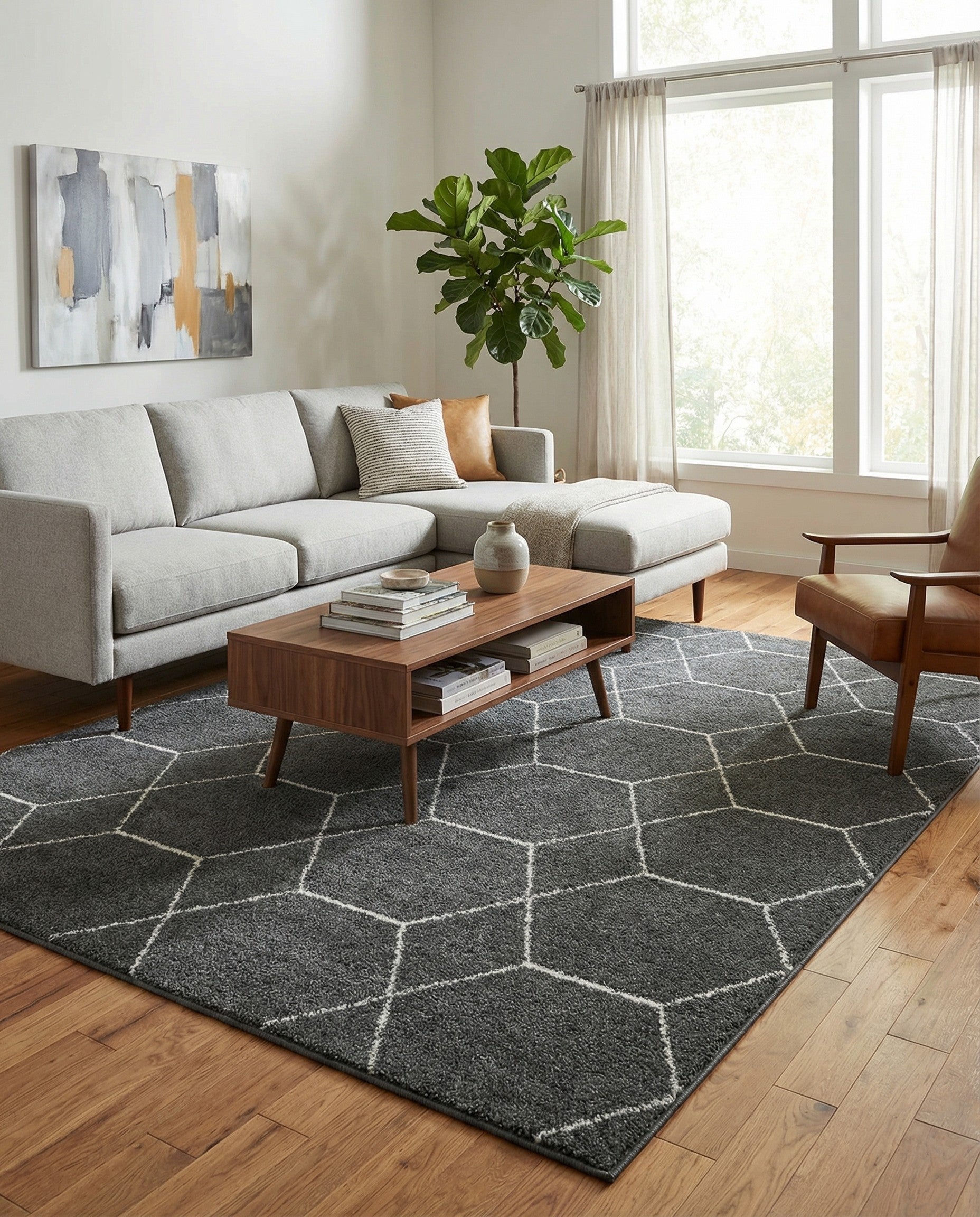 A 9x12 rectangular gray area rug with a modern white trellis pattern, suitable for a living room.