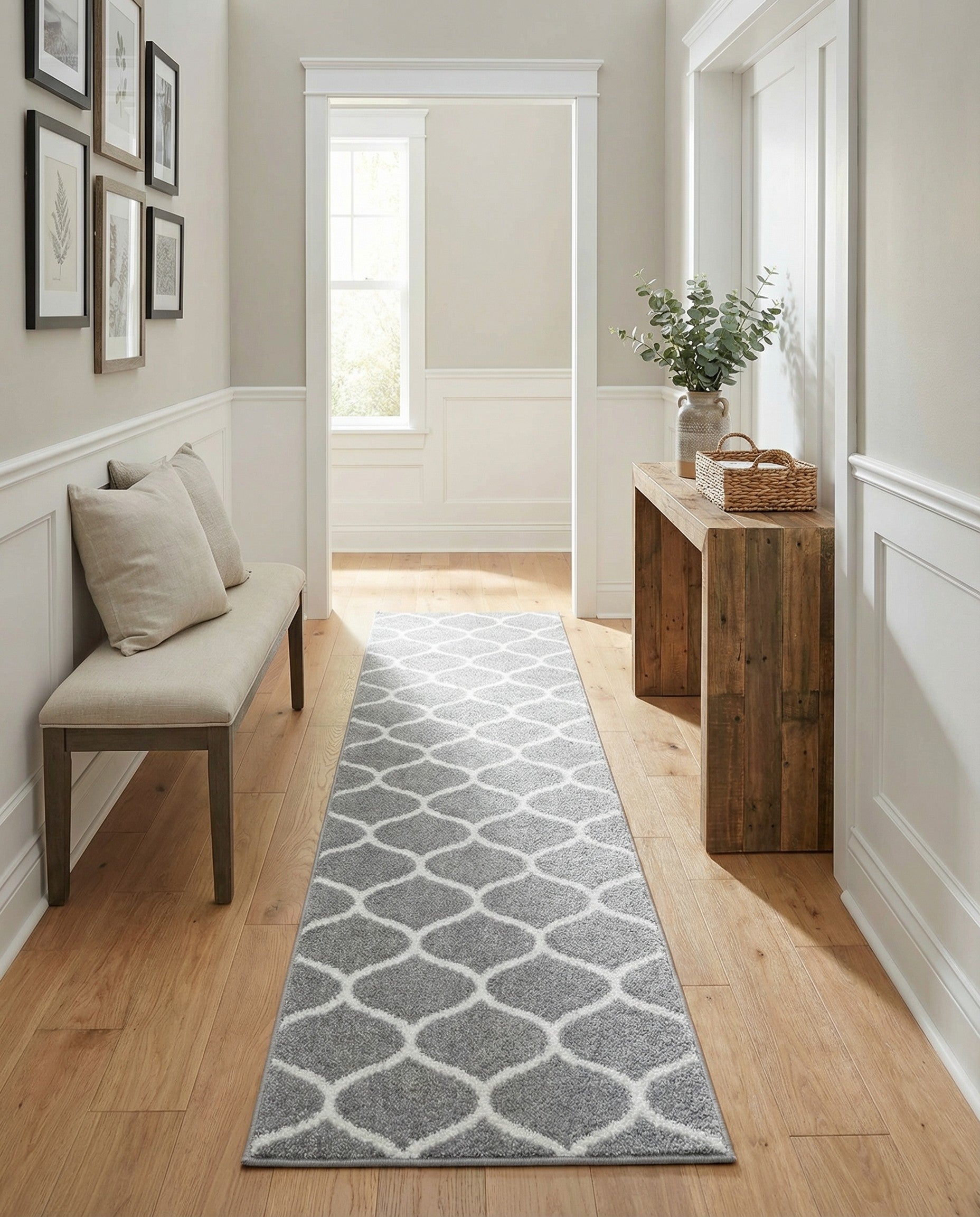 A 10 ft runner rug in gray with a white modern trellis pattern, suitable for a hallway.