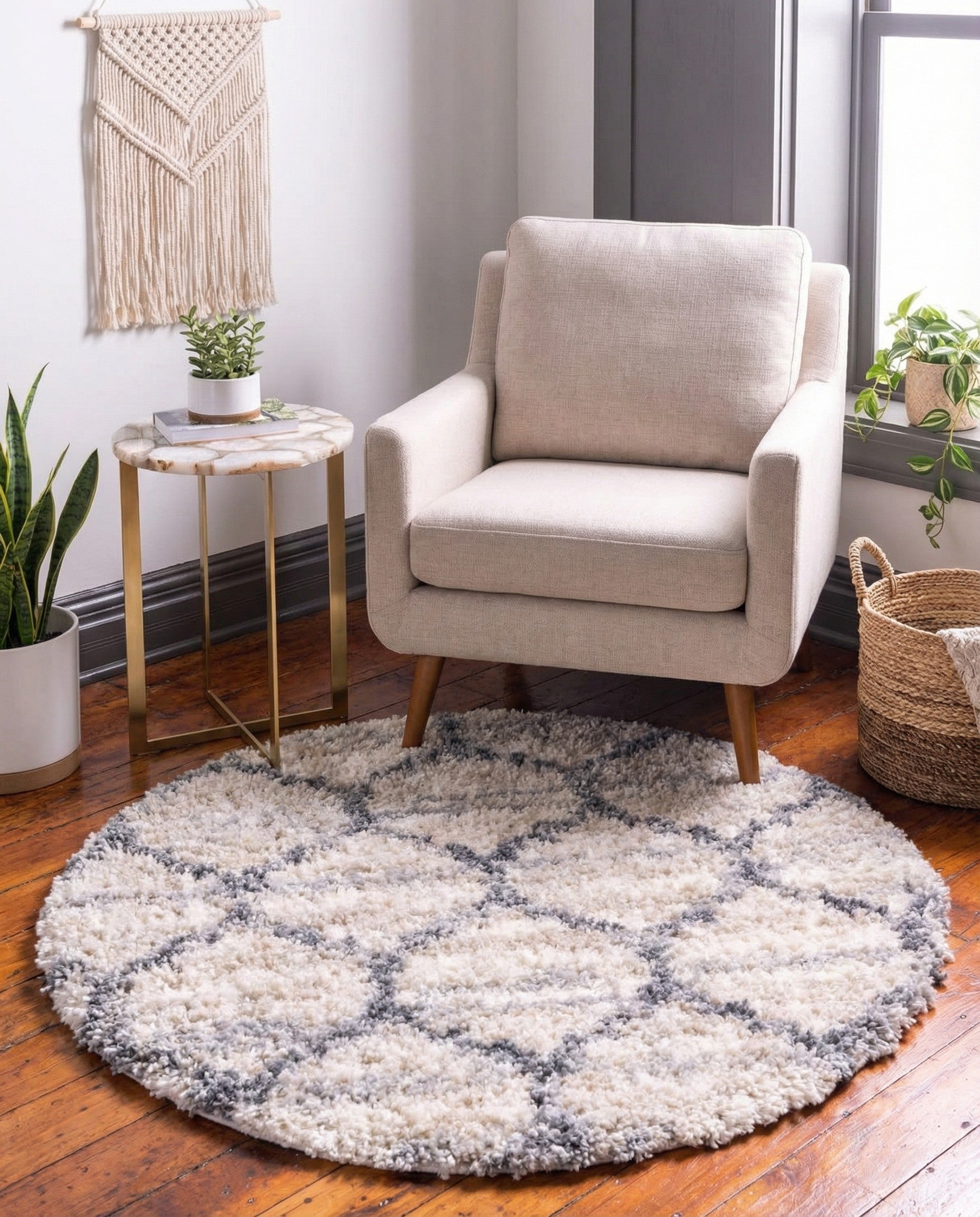 A 3' 3 round Athena Shag rug featuring a modern trellis pattern in ivory, cream, and brown tones.