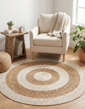 4' 1 x 4' 1 Handmade Braided Jute Round Rug