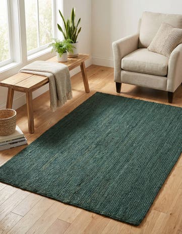 4' 1 x 6' 1 Handmade Braided Jute Rug