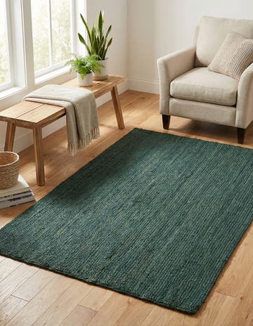 4' 1 x 6' 1 Handmade Braided Jute Rug