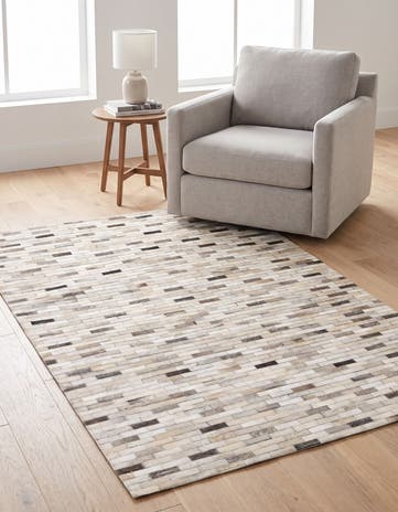 3' 11 x 6' 1 Cowhide Stocks Rug