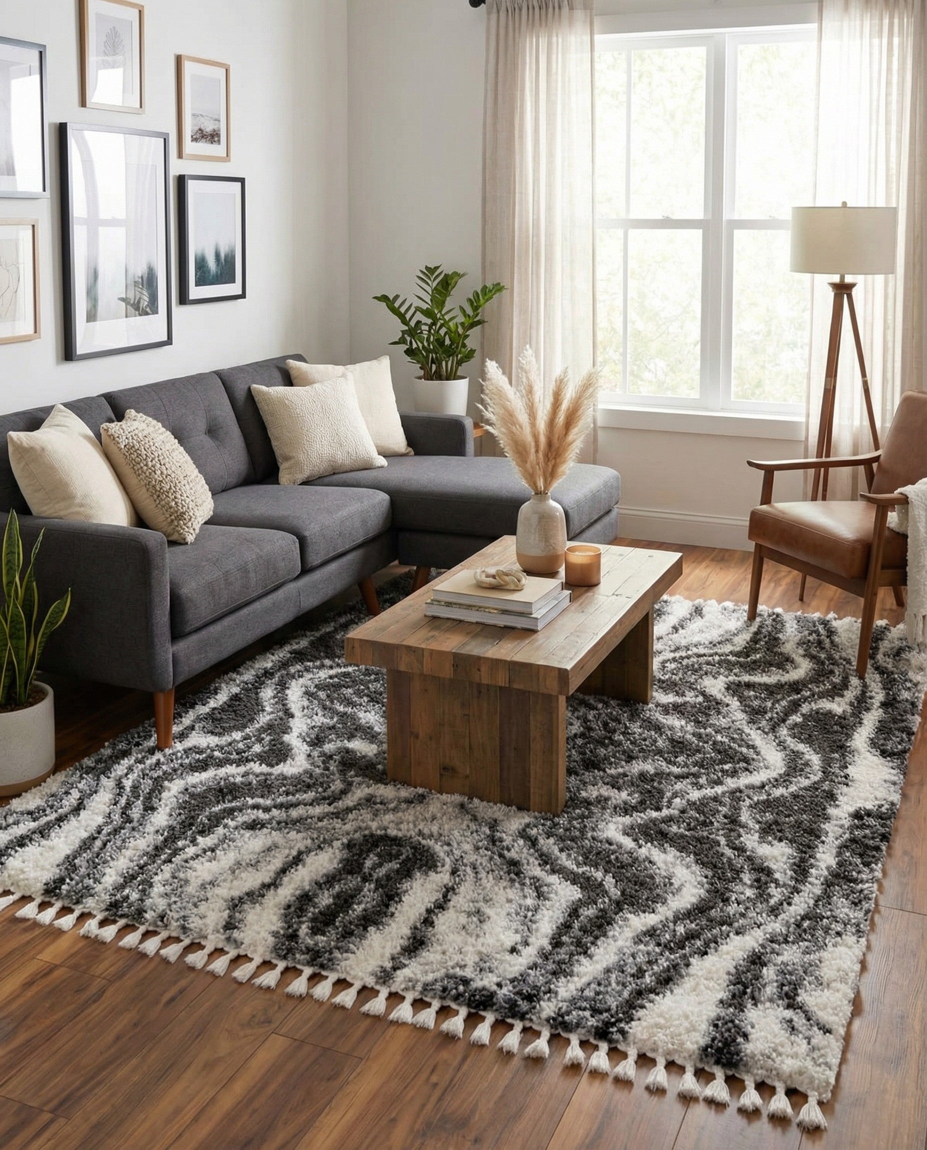 A rectangular 8x10 Athena Shag rug featuring a bold, modern black and white wavy stripe pattern with a plush pile.