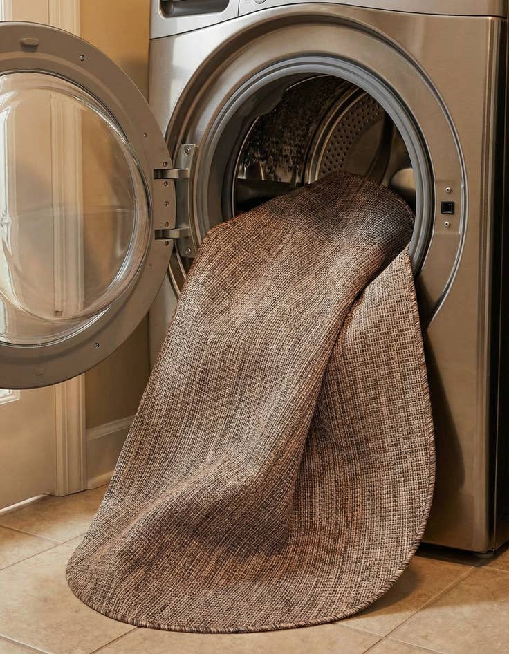 Detail image of  4' 1 x 6' 1  Washable Solid Indoor / Outdoor Oval Rug