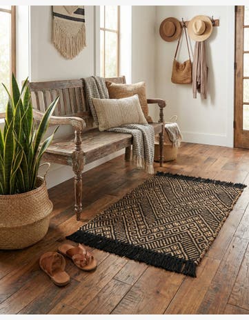 Black and Natural Handmade Braided Jute Rug