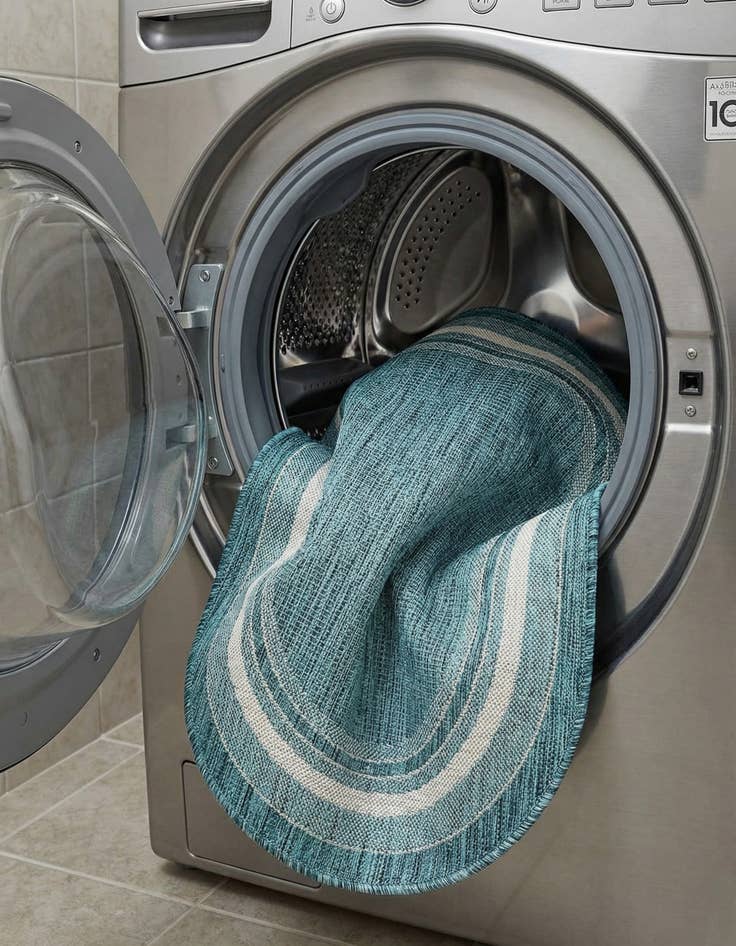 Detail image of 5' 3 x 8'  Washable Border Indoor / Outdoor Oval Rug