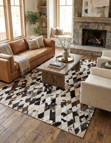 5' 7 x 8' Cowhide Stocks Rug