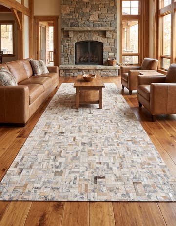 4' 11 x 8' 1 Cowhide Stocks Rug