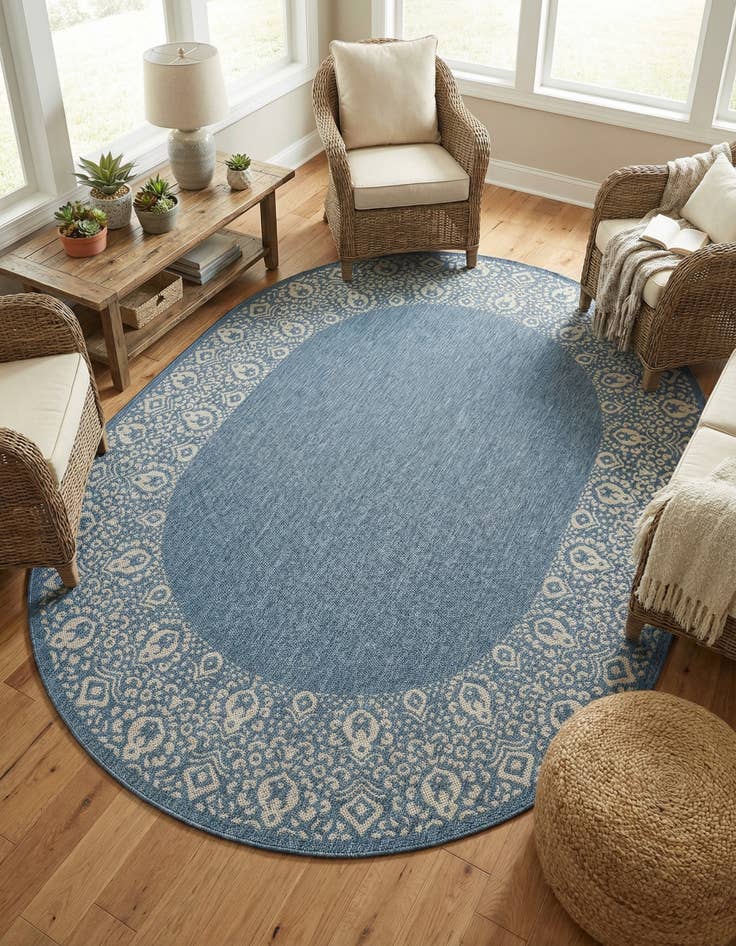 Detail image of 7' 10 x 10' Easy-Clean Border Indoor / Outdoor Oval Rug