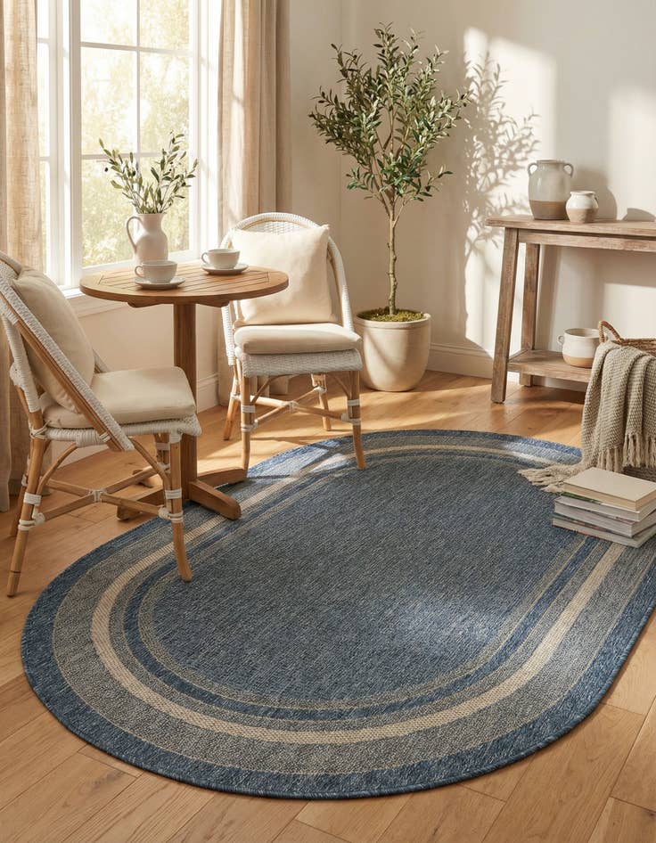 Detail image of 4' x 6' Easy-Clean Border Indoor / Outdoor Oval Rug