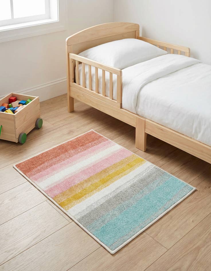 Detail image of 2' 2 x 3' Rainbow Stripes Whimsy Kids Rug