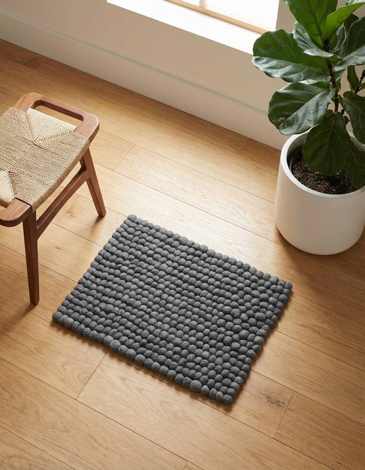 Detail image of 2' 2 x 3' 1  Hand Woven Felt Ball Wool Rug