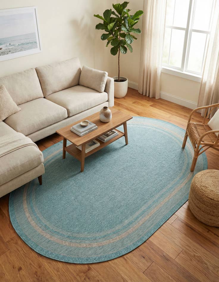 Detail image of 7' 10 x 10' Easy-Clean Border Indoor / Outdoor Oval Rug