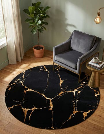 Black and Gold Vogue Geo Round Rug