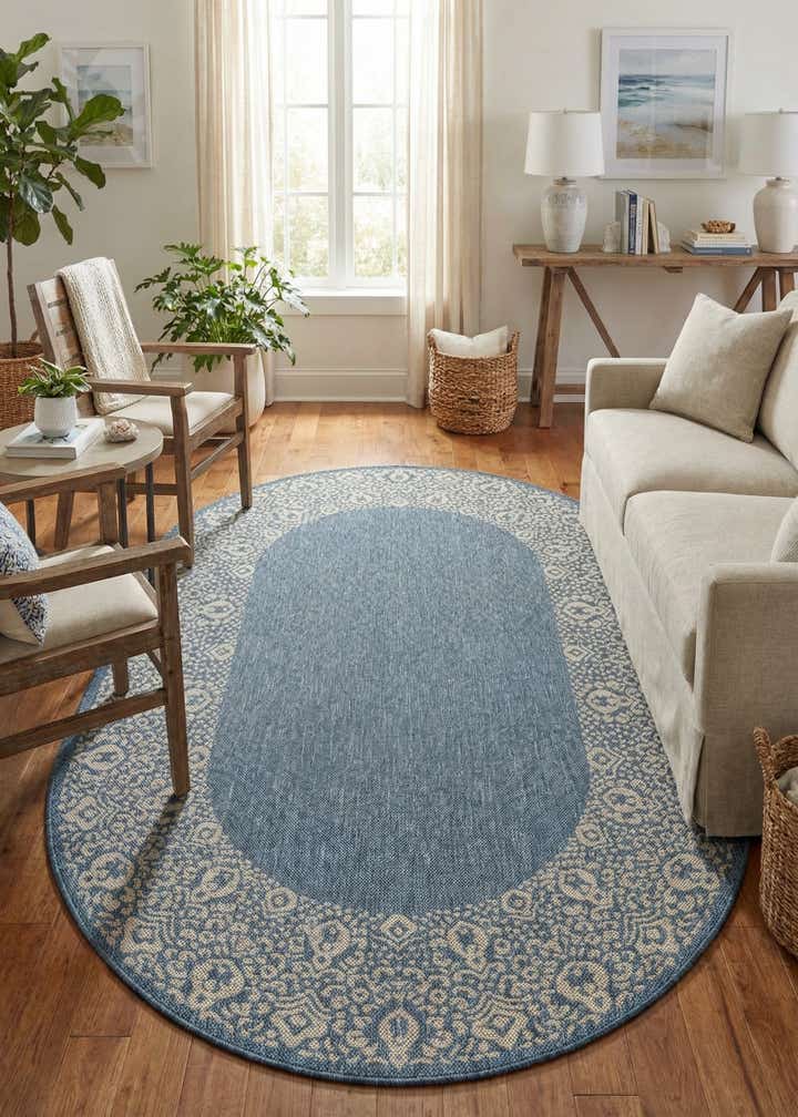 5' 3 x 8' Easy-Clean Border Indoor / Outdoor Oval Rug