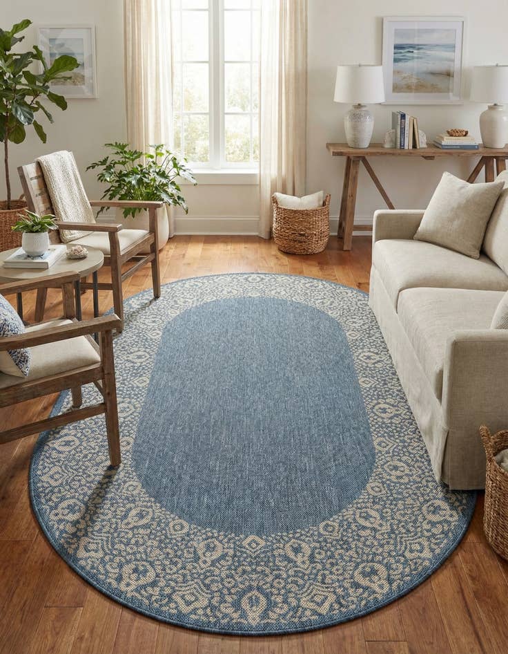 Detail image of 5' 3 x 8' Easy-Clean Border Indoor / Outdoor Oval Rug