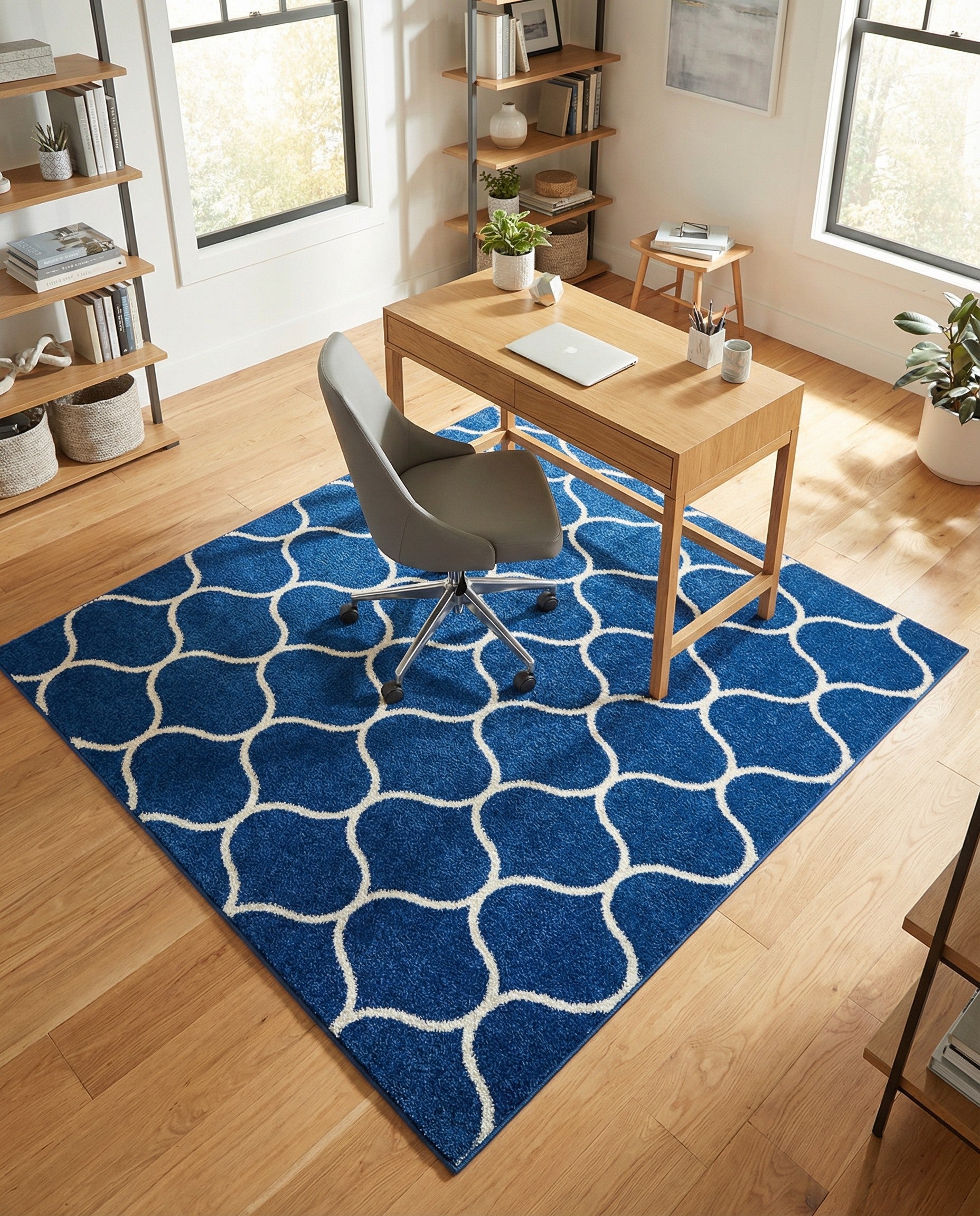 A 6'x6' square navy blue area rug with a repeating white modern trellis pattern, suitable for indoor spaces.