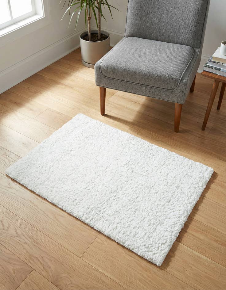 Detail image of 2' 2 x 3' Solid Frieze Rug