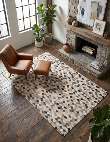 4' 8 x 6' 7 Cowhide Stocks Rug