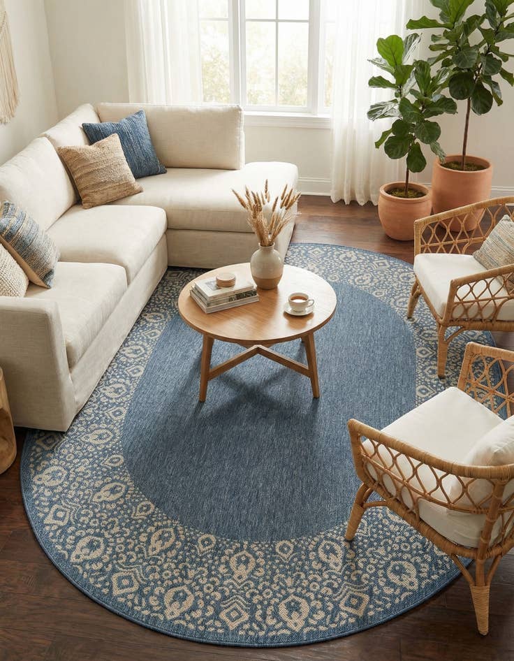 Detail image of 7' 10 x 10' Easy-Clean Border Indoor / Outdoor Oval Rug