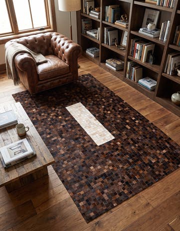 5' 2 x 8' 1 Cowhide Stocks Rug