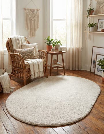 Ivory Solid Frieze Oval Rug