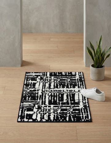 Black Vince Camuto Rug