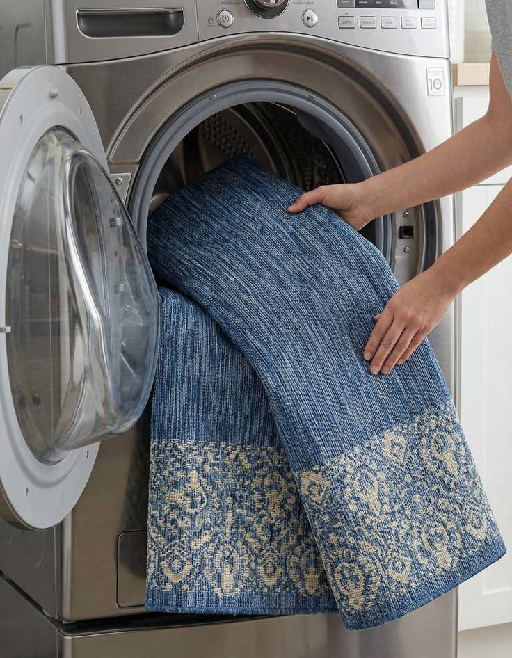 Detail image of  7' x 10'  Washable Border Indoor / Outdoor Rug