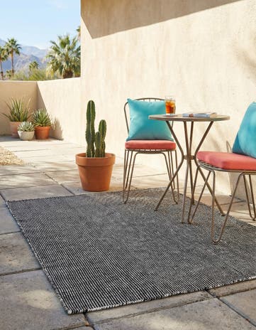 4' 1 x 6' 1 Easy-Clean Jill Zarin Palm Springs Indoor / Outdoor Rug