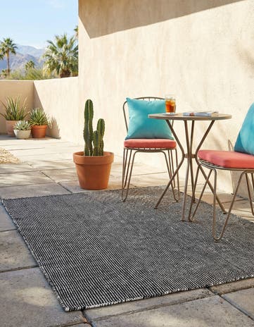 4' 1 x 6' 1 Easy-Clean Jill Zarin Palm Springs Indoor / Outdoor Rug