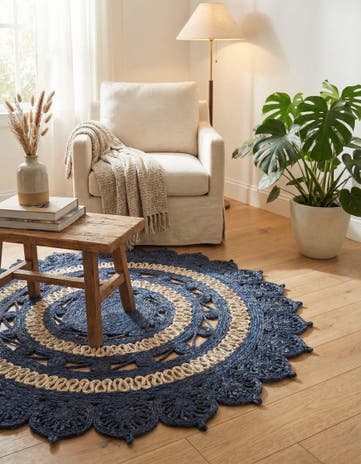 4' 1 x 4' 1 Handmade Braided Jute Round Rug