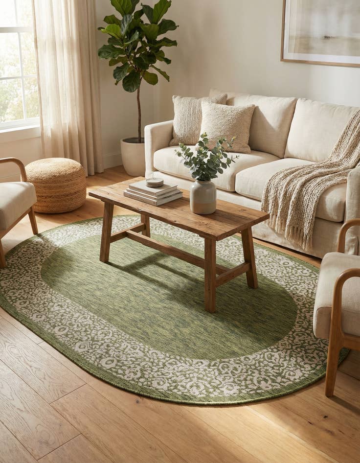 Detail image of 5' 3 x 8' Easy-Clean Border Indoor / Outdoor Oval Rug