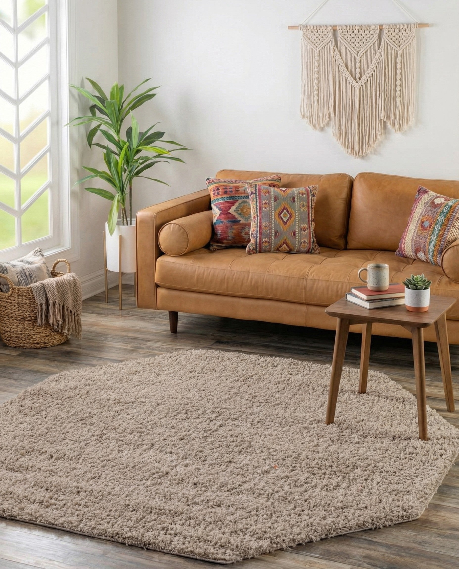 A soft, textured 4' 0 x 4' 0 octagon shag rug in a blend of brown and tan tones, perfect for an indoor living space.