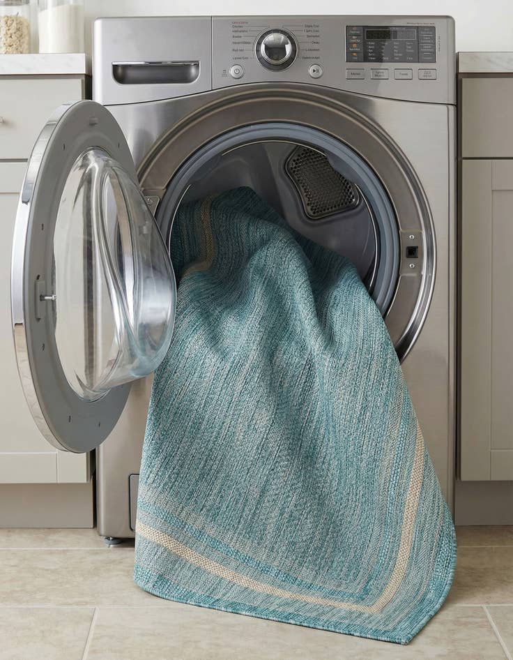 Detail image of  5' 3 x 8'  Washable Border Indoor / Outdoor Rug