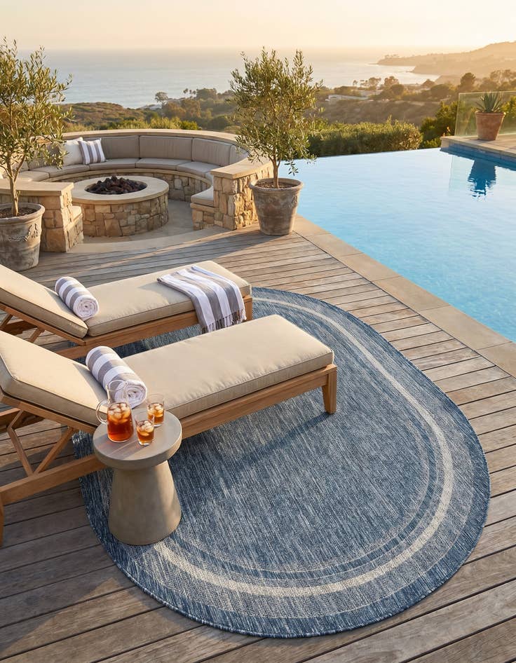 Detail image of 5' 3 x 8' Easy-Clean Border Indoor / Outdoor Oval Rug