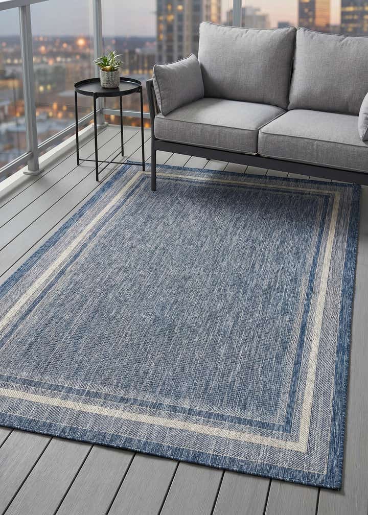 5' 3 x 8' Easy-Clean Border Indoor / Outdoor Rug