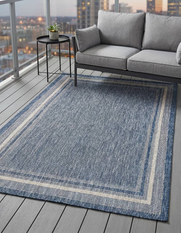 Detail image of 5' 3 x 8' Easy-Clean Border Indoor / Outdoor Rug