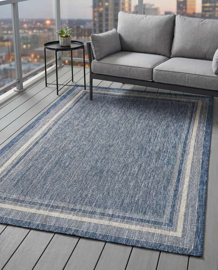 5' 3 x 8' Easy-Clean Border Indoor / Outdoor Rug
