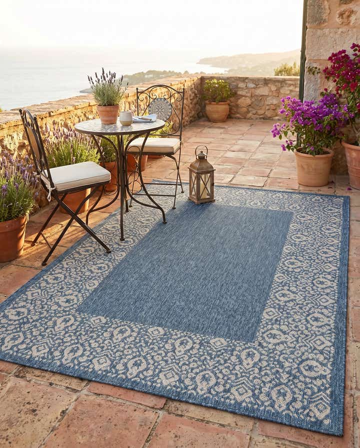 5' 3 x 7' Easy-Clean Border Indoor / Outdoor Rug