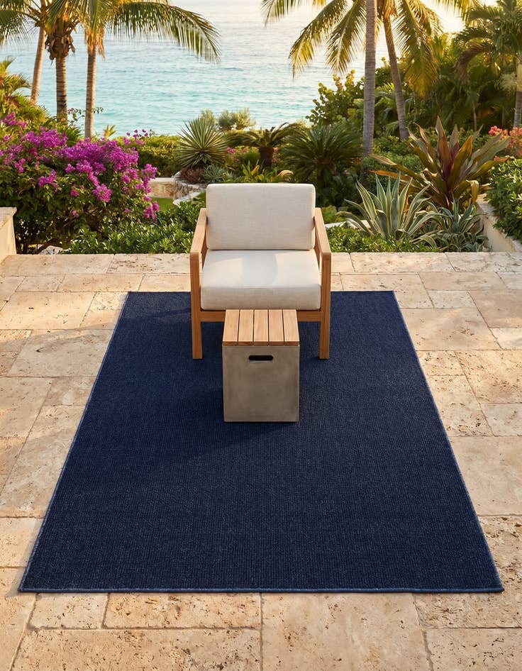 Detail image of 4' 1 x 6' 1 Easy-Clean Solid Indoor / Outdoor Rug
