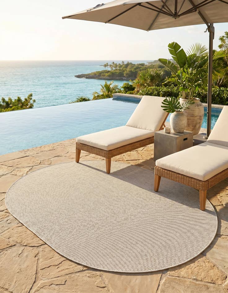 Detail image of 7' 10 x 10' Easy-Clean Solid Indoor / Outdoor Oval Rug