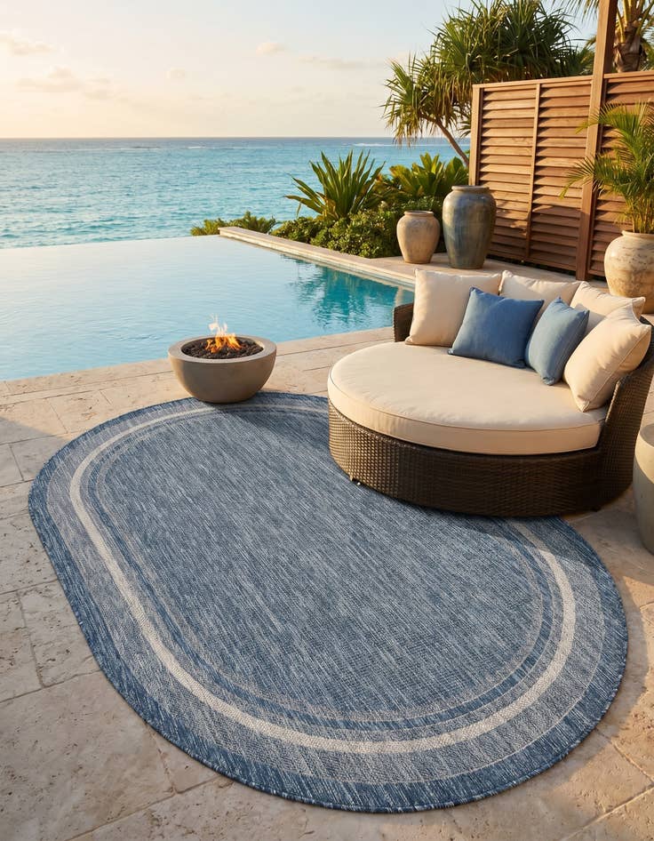 Detail image of 5' 3 x 8' Easy-Clean Border Indoor / Outdoor Oval Rug